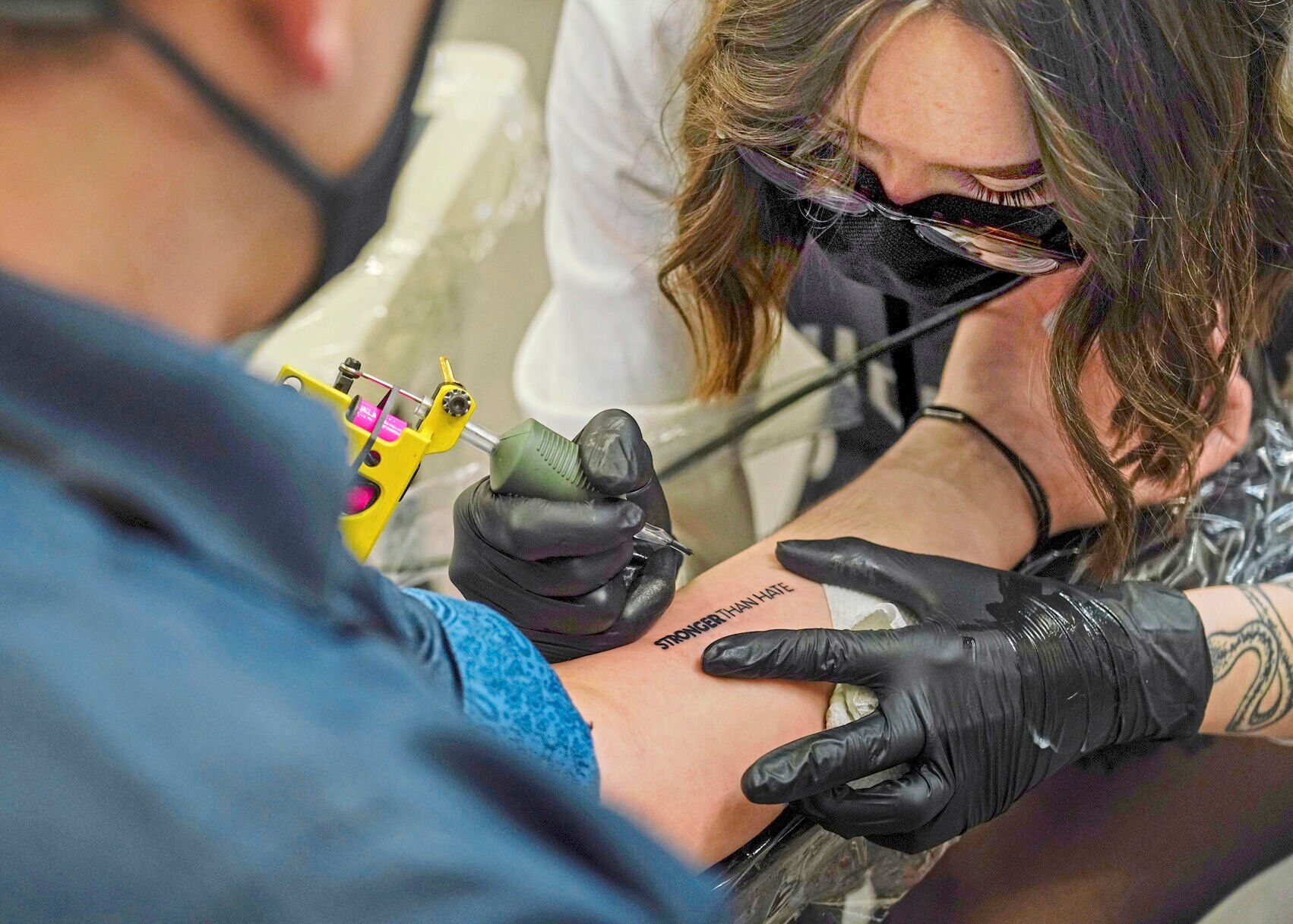 LIFE-RELIG-SHOOTING-SURVIVORS-TATTOOS-4-PG